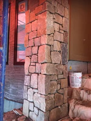 Stone pillar construction for commercial building